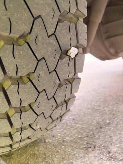 Metal embedded in a tyre