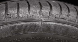 Shiny, cracked tyres
