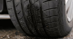 Tyre with wet patch due to puncture