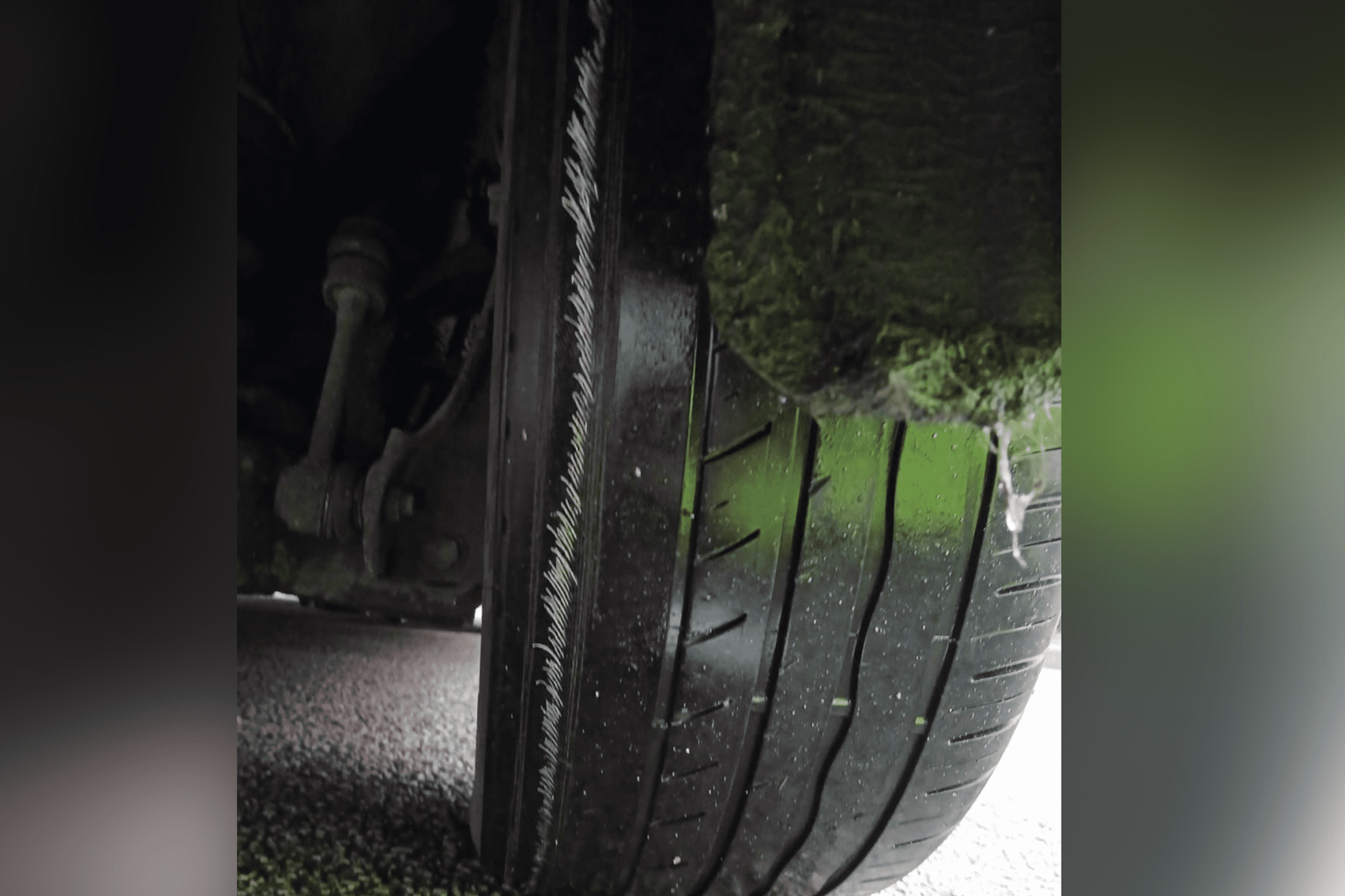 Close-up of a severely worn vehicle tyre with exposed cords discovered during Liverpool licensing enforcement