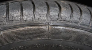 Shiny, cracked tyres